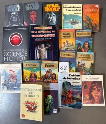 a lot of books that are on the table