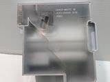 a close up of a plastic object on a white surface