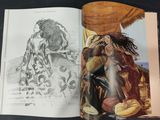 an open book with a drawing of a man and a woman sitting on a couch