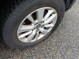 a close up of a tire on a car