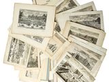 une pile de vieux livres sur lesquels figurent des images de bâtiments