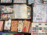 many different types of stamps on the table