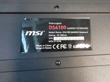 a close up of a laptop with a sticker on it