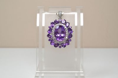 purple crystal flower pendant with clear acrylic display case