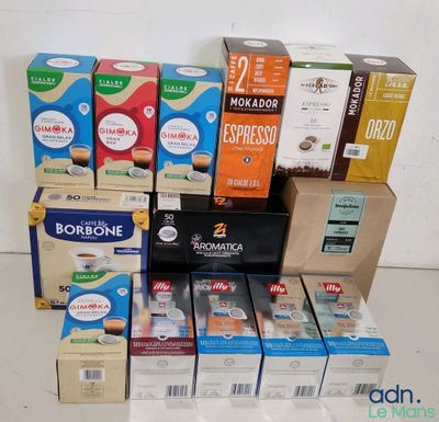 several boxes of coffee are stacked on top of each other