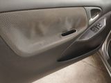 a close up of a car door handle with the door handle open