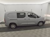 the van is parked in a clean room with a checkered floor