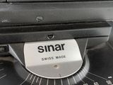 a close up of a scale with the name of a person on it