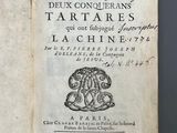 an open book with a drawing of a lion on it