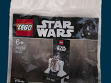 a bag of lego star wars items sitting on a table