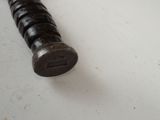 a close up of a baseball bat on a table