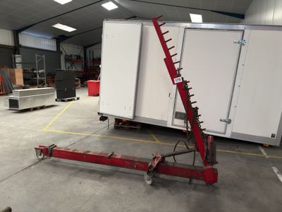 an image of a large white box truck in a warehouse