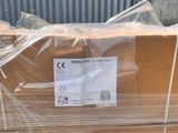 a stack of boxes that have been wrapped in plastic