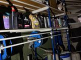 a garage with a lot of different items on the shelves