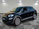 a black fiat suv parked on a checkered tile floor