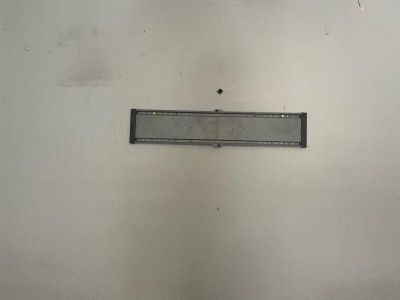 a picture of a sign on the wall of a bathroom