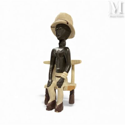Sculpture Baule colon Groupe en bois sculpté et polychrome à…