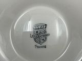 a white plate with a black and white design on it