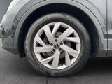 a close up of a car tire on the street