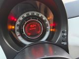a close up of a speedometer in a car ' s dashboard
