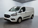 the white van is parked in a large room