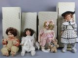 five dolls that are sitting next to each other