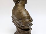 an antique bronze bust of a woman on a pedestal