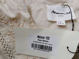 an image of a label on a dress with a price tag on it