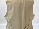 the back of a beige vest on a mannequin mannequin mannequin mannequin mannequin mannequin mannequin mannequin