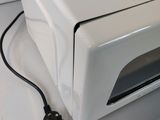a microwave that is sitting on top of a counter