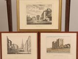 two framed prints of a view of a city and a church