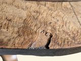 a close up of a table with a wooden top