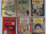 six livres pour enfants sont alignés sur une surface blanche