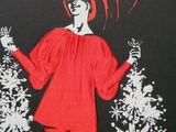 a picture of a woman in a red top and red pants