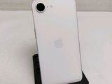 a close up of a white iphone with a camera on top of it