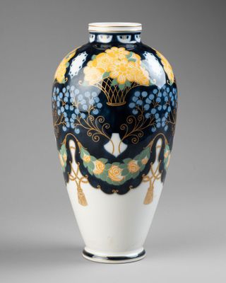an image of a blue and white vase with a design on it