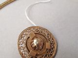 gold plated necklace with a pearl pendant and a gold chain