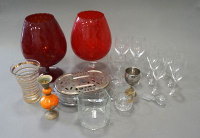 a lot of wine glasses that are sitting on a table