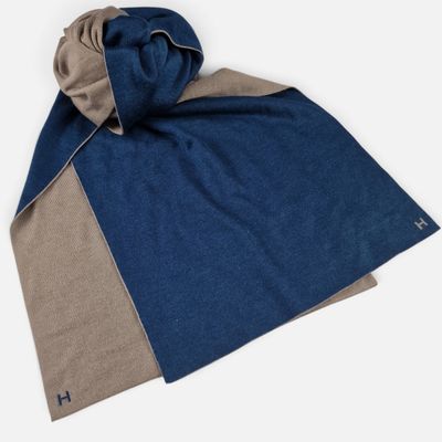 a blue and brown scarf on a white background