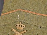 an image of a military hat with a crossbone and a crown on it