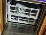 a dishwasher that is sitting inside of a dishwasher