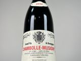 a bottle of wine that is sitting on a table