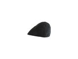 a black rock sitting on top of a white surface