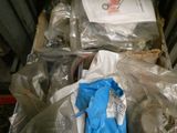 a pile of plastic bags sitting on top of a metal shelf