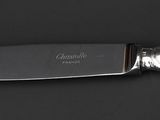 a knife that is sitting on top of a table