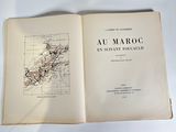 an open book with a drawing of a map on it