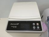 a small machine that is sitting on a counter