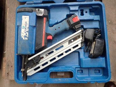 a blue tool box with a stapler and a stapler in it