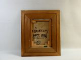 a picture of a picture of a wooden frame with writing on it