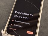 a close up of a cell phone in a box on a table